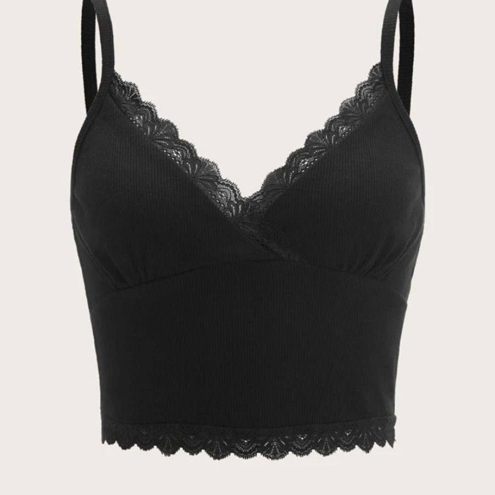 This is a black lace top, never worn, perfect for Summer.